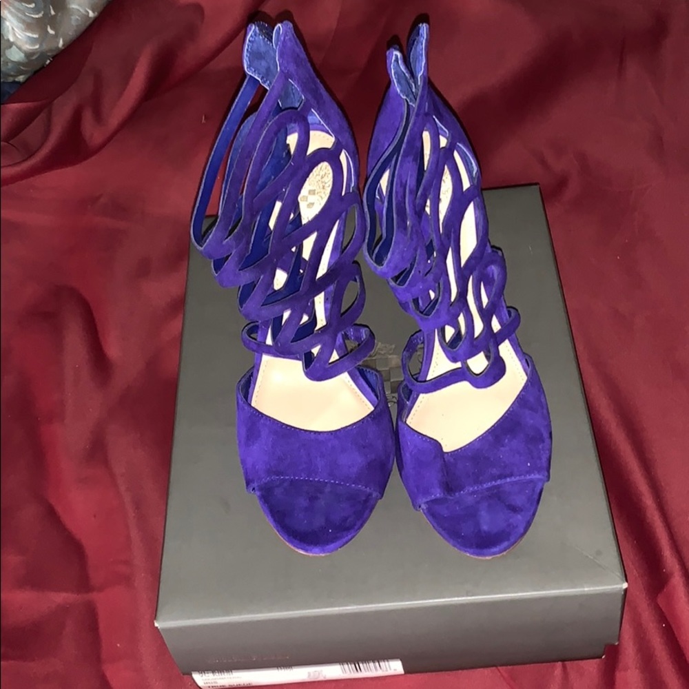 Brand new, beautiful blue Suede cage sandals.